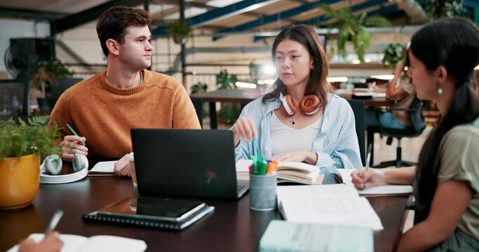 College, students and friends studying for learning, education or knowledge on laptop together. Teamwork, university and group of people in discussion for writing notes or creative research project