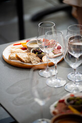 Wine tasting. Sommelier pours wine into a glass
