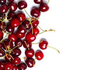 Pile sweet red cherries isolated on white background