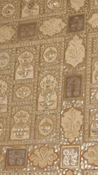 Exterior of the Wall of the Mirror Room Inside Sheesh Mahal in Amer (Amber) Palace complex. Amer, Rajasthan, India. Horizontal camera pan