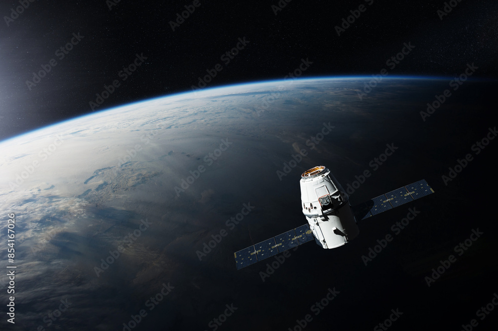 Wall mural planet earth with satellite launched into outer space. elements of this image furnished by nasa.