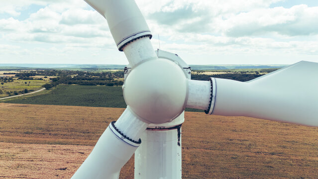 Close up Wind Turbine blade producing alternative gren energy. Green deal and zero carbon footprint