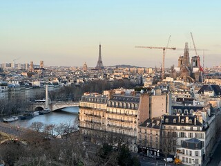 Fototapeta premium Beautiful buildings, Eiffel tower and river in Paris, view from hotel window