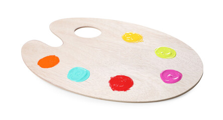 Wooden artist's palette with samples of paints isolated on white