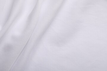 Fototapeta premium Texture of white fabric as background, top view