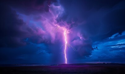 A bolt of lightning from a high based thunderstorm strikes the countryside early one summer morning