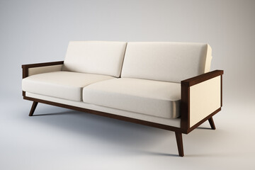 A close up of a couch with a white cover on it