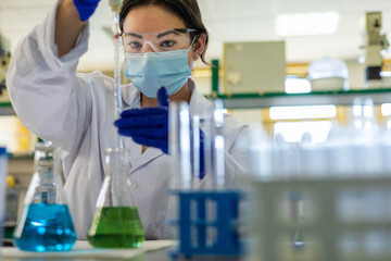 a scientist in the lab doing an experiment