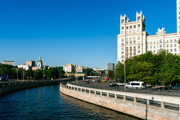 Moscow, Russia - May 23, 2024: Kotelnicheskaya Embankment, Moskva River, view of the river and the...