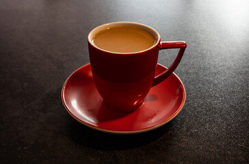 cup with  coffee  on the table