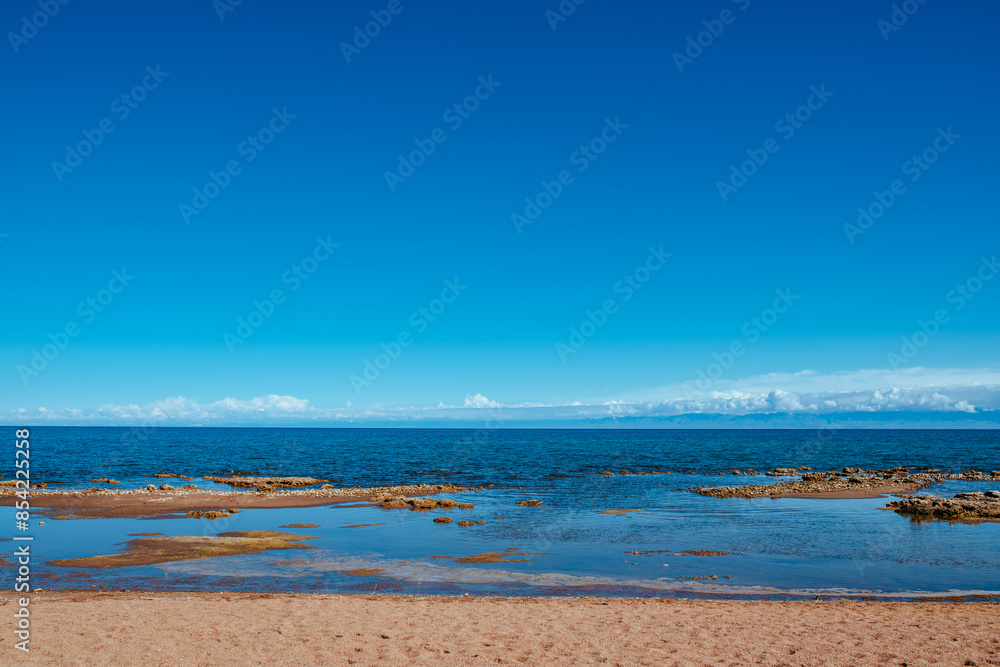 Wall mural Issky-kul lake in Kyrgyzstan, summer landscape