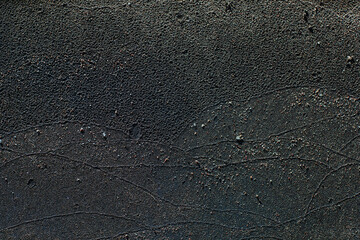Black sand on beach texture or background