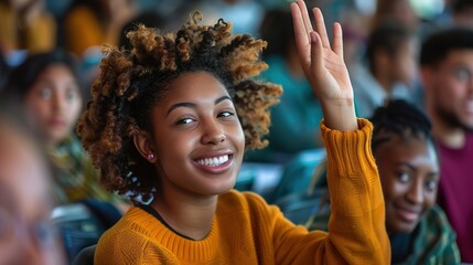 Fototapeta premium Happy African American student raising her hand to ask a question during lecture in the classroom.