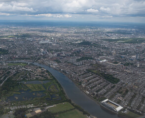 Overlooking the urban sprawl of the city of London from an airplane