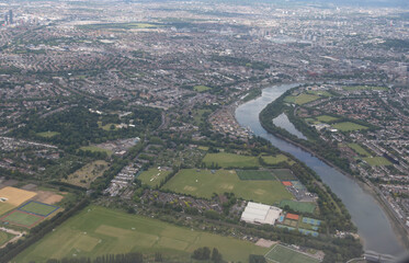 Overlooking the urban sprawl of the city of London from an airplane