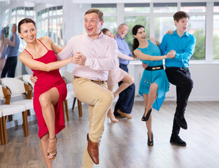 Adult couple dancing and practicing in dance class