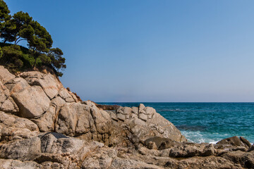beach in Cala Sa Boadella Bay, Costa Brava, Lloret de Mar, Catalonia, Spain. Beautiful seascape. huge waves