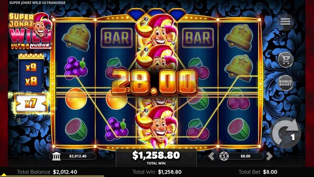 Playing online casino slot machine game and winning big money on a laptop.