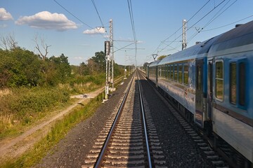 Fototapeta premium Rails with train, railway travel
