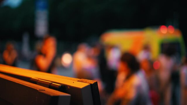 Emergency response with a blurred crowd in slow motion, depicting a chaotic scene of urgency and safety