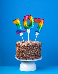 Birthday cake with balloon number 107 - Invitation card on blue background