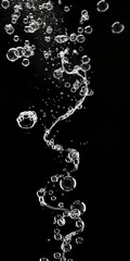 photo of bubbles coming out from a S-curve, black and white, high contrast 