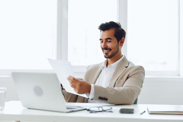 Paper businessman planning holding office laptop