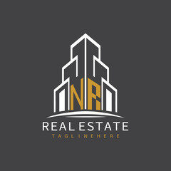 initial monogram logo for real estate with building shape creative design	
