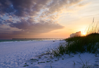 Golden sunset over the Navarre Beach fishig pier in Florida
