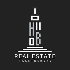 initial monogram logo for real estate with building shape creative design