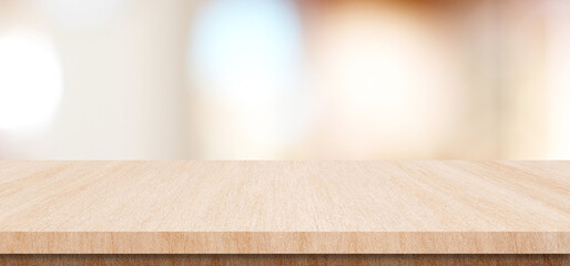 Table and blur background, Wooden counter over blur bokeh light background, Brown wood table top, shelf for food and retail shop, store product display backdrop, banner, mockup, template