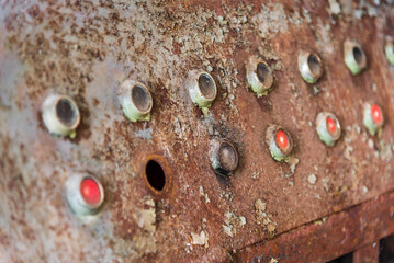 Old Abandoned Rusty Metal Control Panel Close-up With Broken Red Buttons