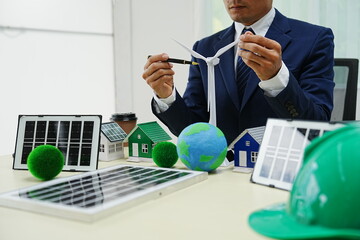 Businessman signs a contract for car insurance in an eco-friendly office. This agreement emphasizes renewable energy and green technology, commitment to clean power and environmental responsibility.