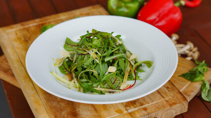 apple salad served on the white plate