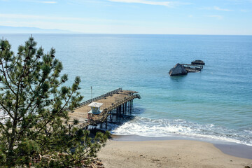Fototapeta premium Aerial view of damaged Seacliff Pier and SS Palo Alto cement ship damaged by the winter storm in 2023