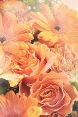 beautiful flower bouquet in orange colors, close up floral background