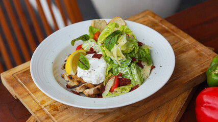 Caesar Salad served in white plate