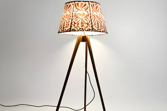 Decorative tripos standing light / floor lamp / lampshade isolated on white