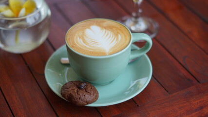 coffee art served with a cookie
