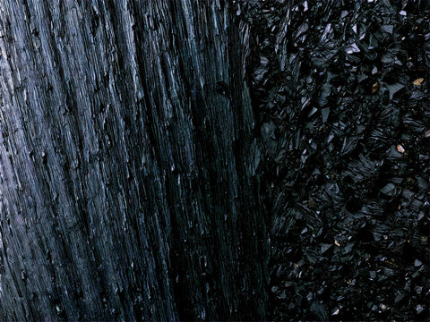 Argillite A dark argillite with a smooth slate like texture floating and lit to show