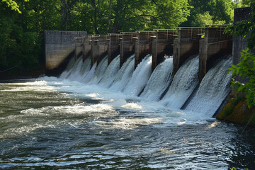 A hydroelectric dam with flowing water. Hydroelectric Dam