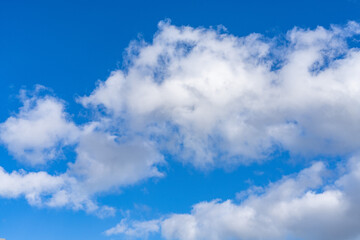 Cumulus clouds are clouds that have flat bases and are often described as puffy, cotton-like, or...
