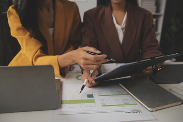 Team of business people working together in the meeting room office, teamwork background charts and graphs banner, double exposure successful teamwork,business planning concept.