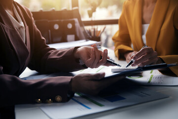 Team of business people working together in the meeting room office, teamwork background charts and graphs banner, double exposure successful teamwork,business planning concept.