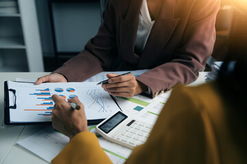 Team of business people working together in the meeting room office, teamwork background charts and graphs banner, double exposure successful teamwork,business planning concept.