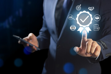 Businessman shows signs of quality assurance, guarantee, ISO certification, standardization...