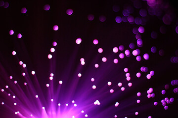 Mystic dark purple background with boke and light on bottom