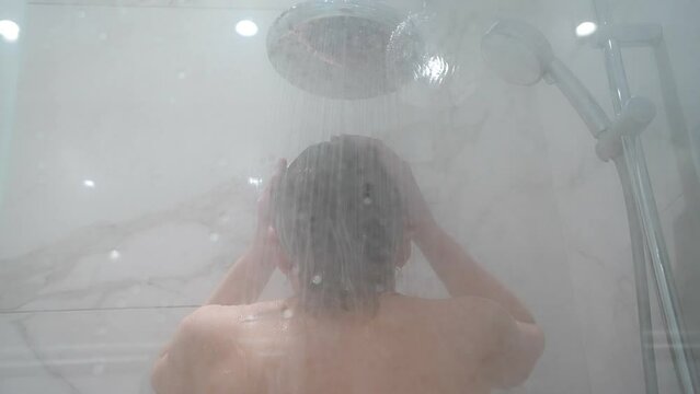 A soothing shower experience in a contemporary bathroom, captured in this video.