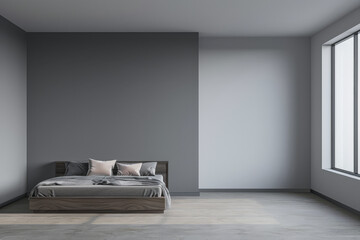 Minimalist master bedroom in light grey tones with minimal furniture, a bed next to a window and ample copy space. Bedroom interiors composition in neutral color.