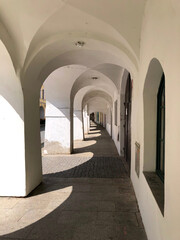 Long colonnade underneath a building
